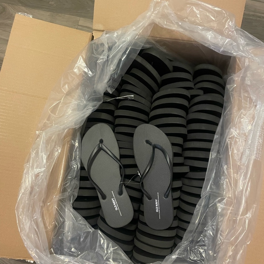 50 Black Old Navy Flip Flops. Variety of sizes pack.